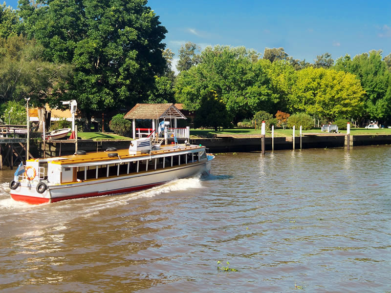 Boat sailing through the islands of the Delta of Tigre near Buenos Aires